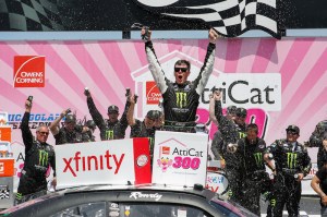 JOLIET, IL - JUNE 21:  Erik Jones, driver of the #54 Monster Energy Toyota, celebrates in Victory Lane after winning the NASCAR XFINITY Series Owens Corning AttiCat 300 at Chicagoland Speedway on June 21, 2015 in Joliet, Illinois.  (Photo by Kena Krutsinger/NASCAR via Getty Images)