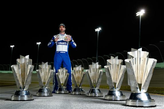 Jimmie Johnson, driver of the #48 Lowe's Chevrolet, poses for a portrait after winning the 2016 NASCAR Sprint Cup Series Championship at Homestead-Miami Speedway on November 20, 2016 in Homestead, Florida.